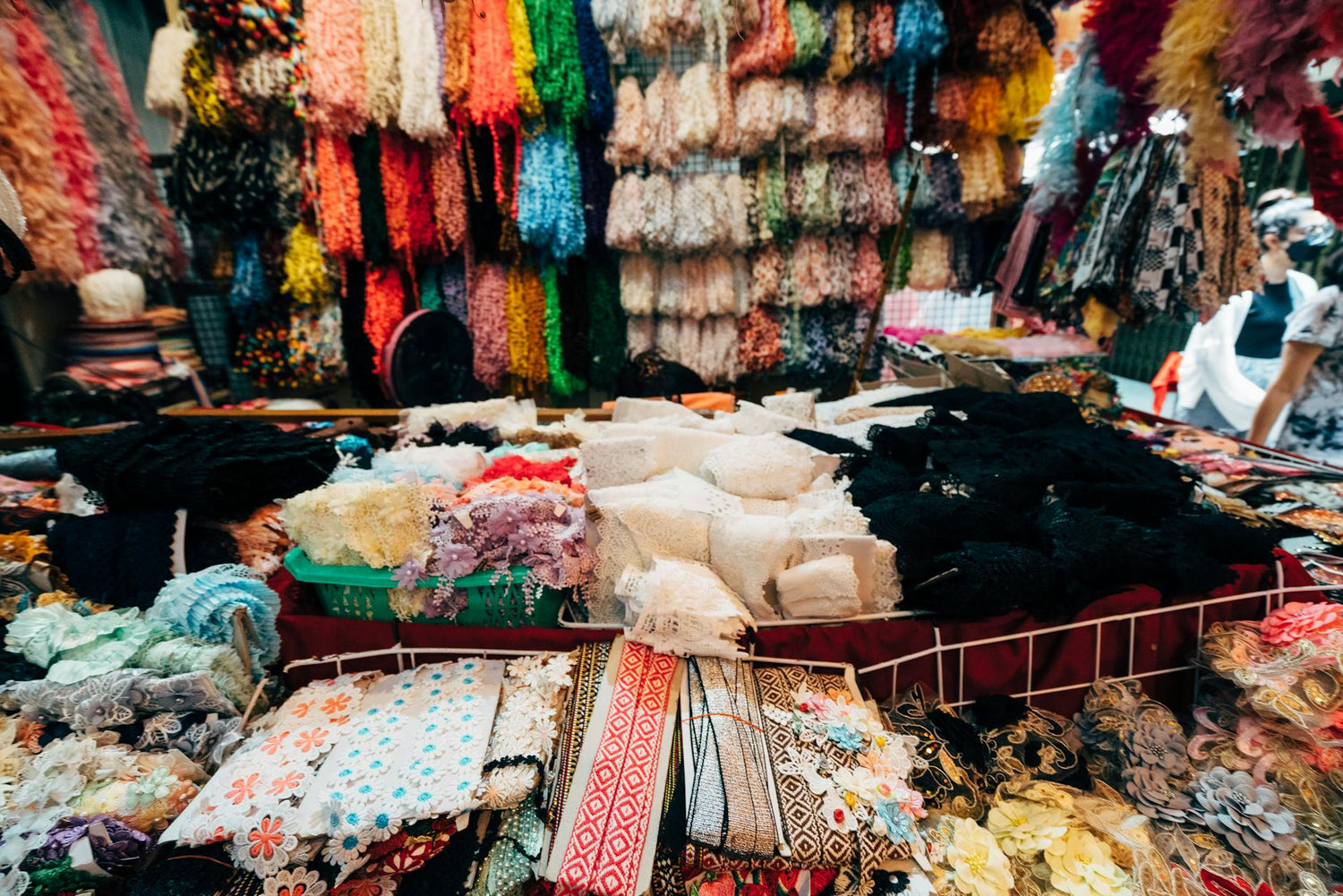 Colorful Chinese market stalls with silk and souvenirs