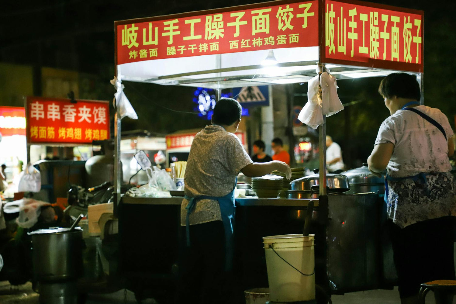Street food stalls at a night market in China