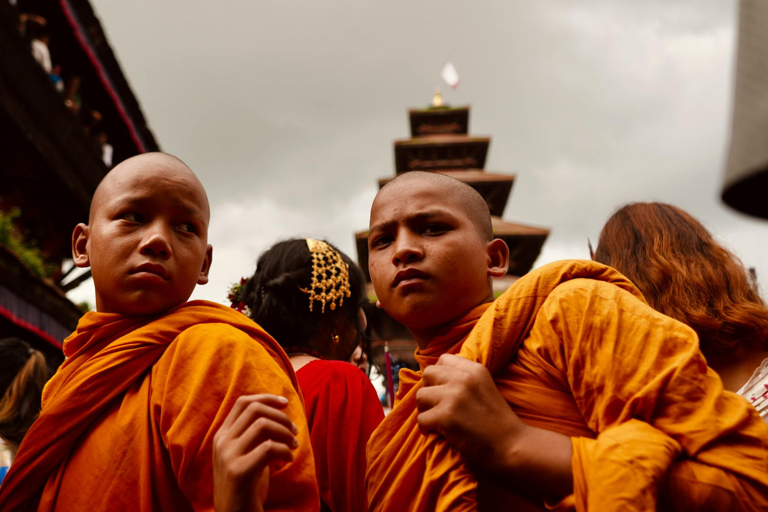 Buddhist monks in ceremonial robes at a temple festival
