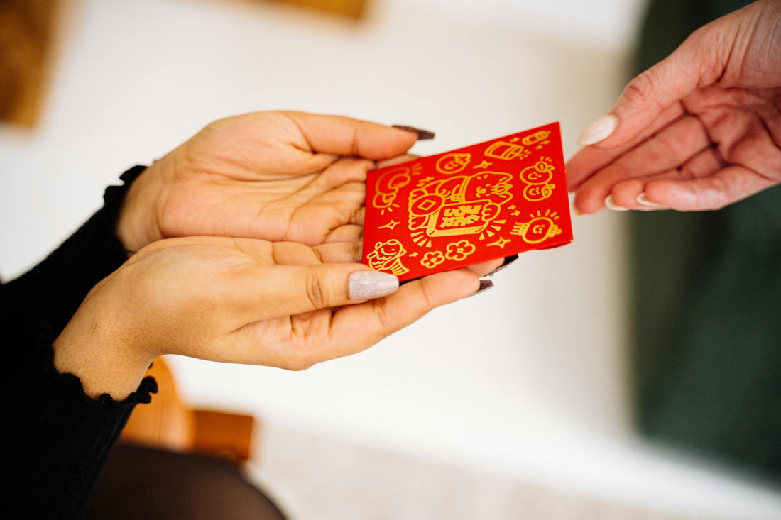 Red gift envelopes and traditional Chinese gifts
