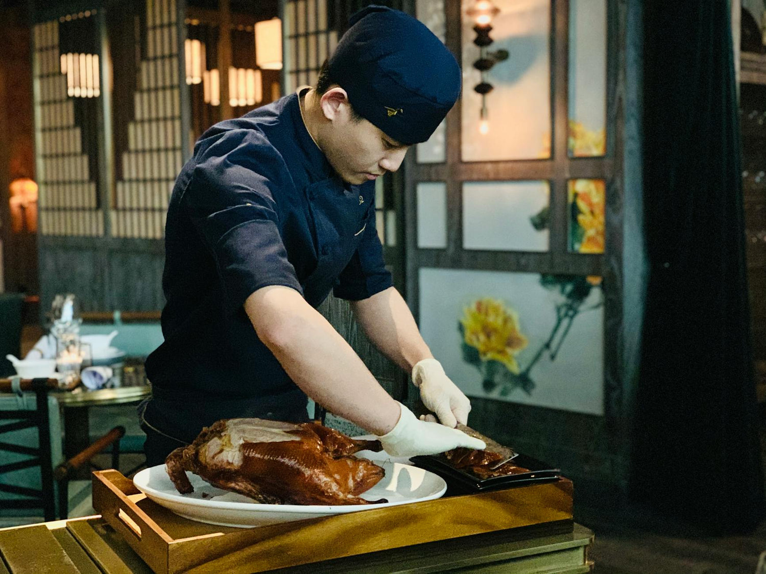 Peking duck being prepared at a Beijing restaurant