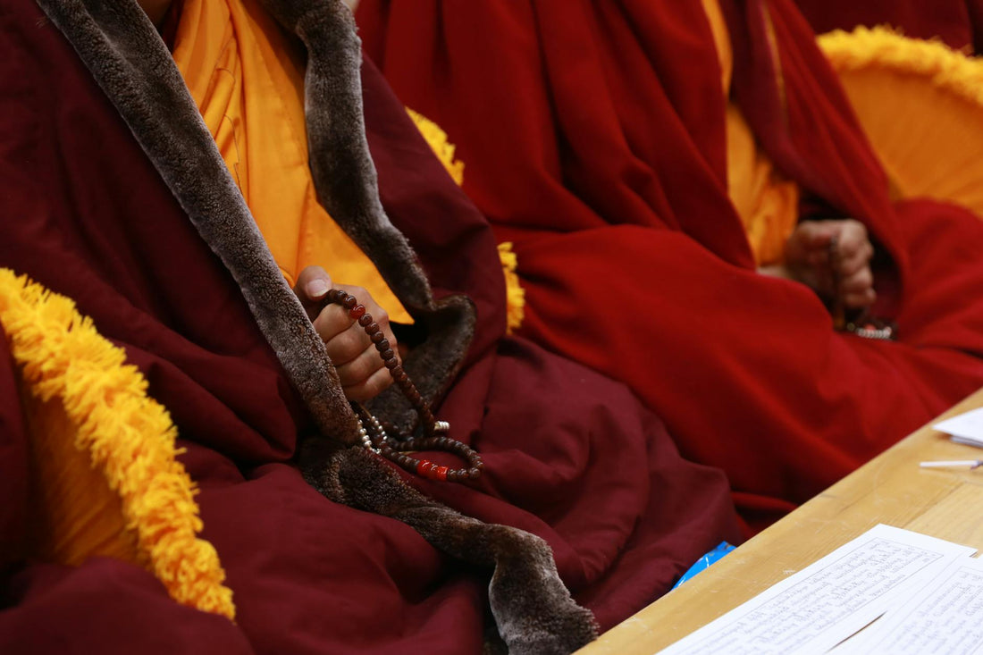 Tibetan Buddhist monastery with prayer flags in the mountains
